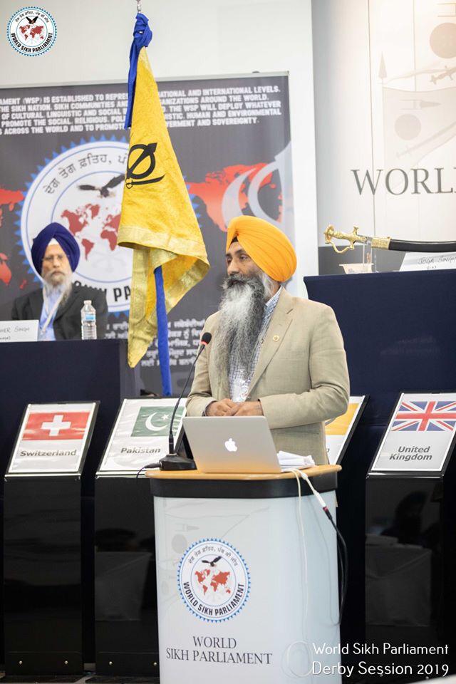 world-sikh-parliament-group-derby-himmat-singh-podium